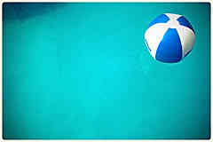 Swimming Pool games A beachball in the water